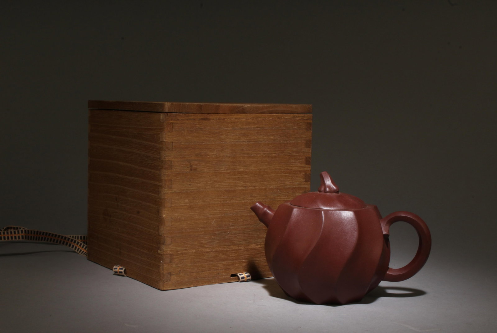 A Zisha Teapot: A Zisha Teapot. Comes with box. Height: 4.4in Diameter: 6.1in.