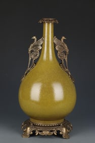 A Tea-Dust Glazed Porclain Vase with Bronze Accent