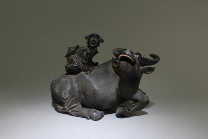 A Carved Wooden Figurine