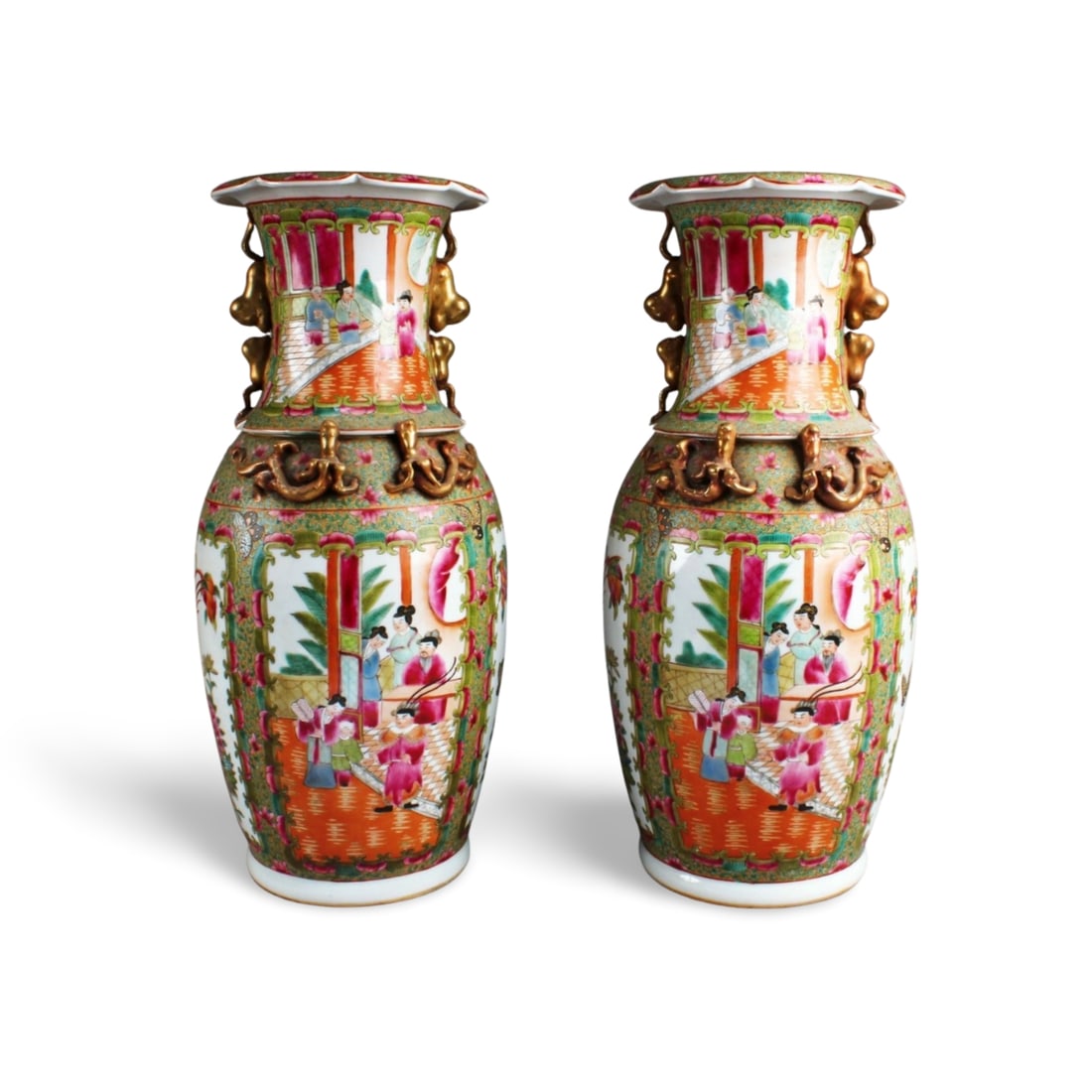 A Pair of Chinese Famille Rose Vases: A Pair of Chinese Famille Rose Vases. Height: 18"