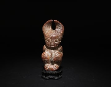 A Carved Jade Ornament with Wood Stand