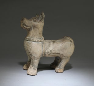 A Pottery Dog Figurine
