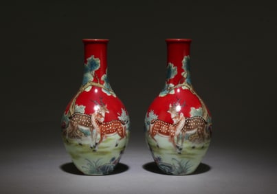 A Pair of Fencai Vases with Deer Motif