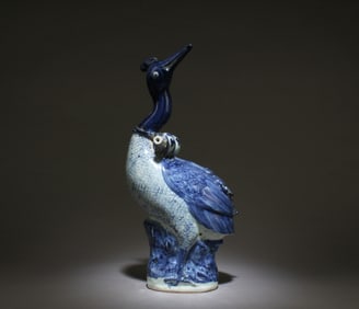 A Blue and White Bird Ornament