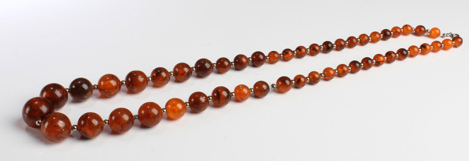 Amber Bead Necklace: Amber Bead Necklace, 49 beads, of various sizes. Length: 15"