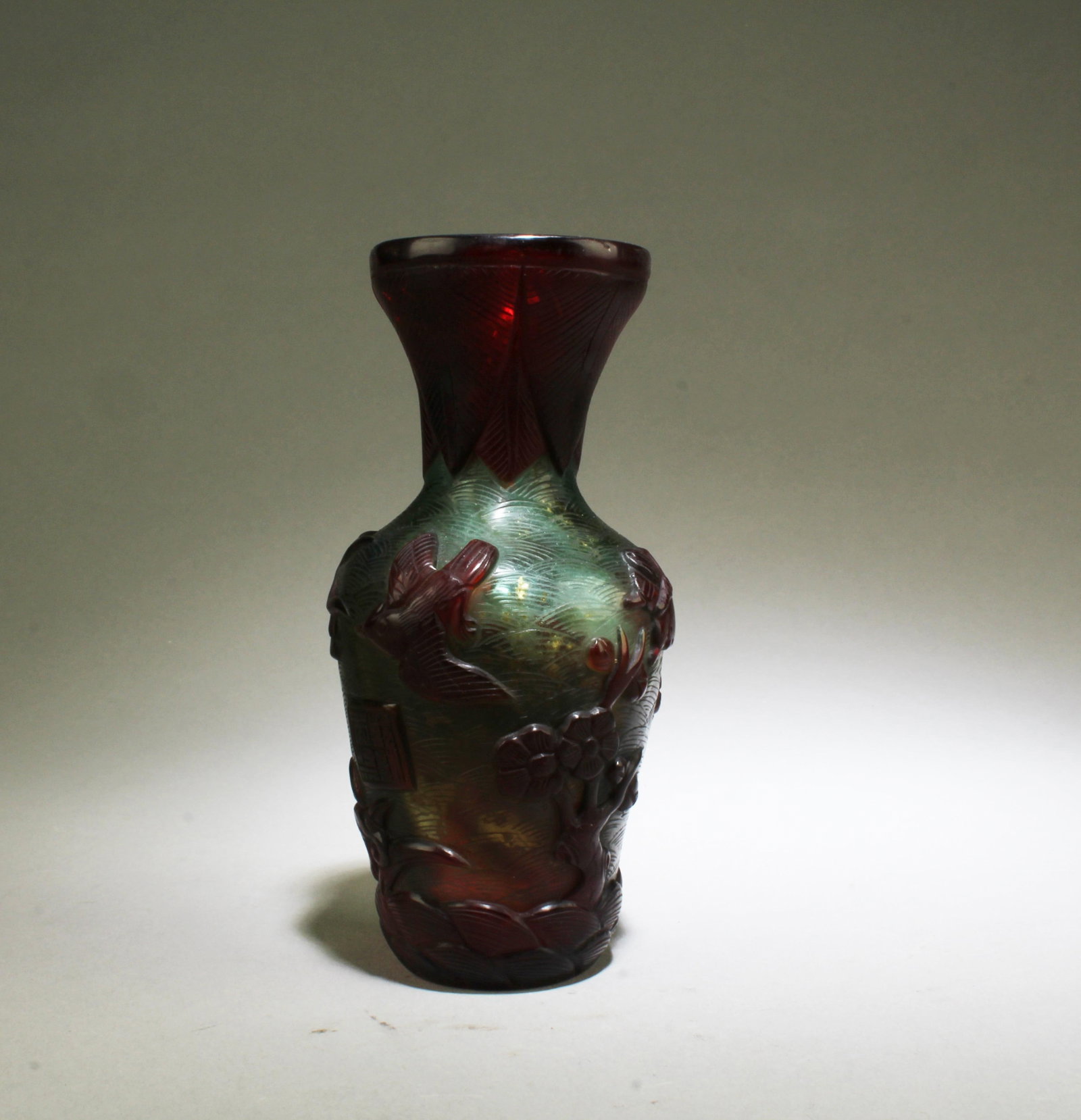 A Peking Glass Vase: A Peking Glass Vase. ' QianLong' mark. Height: 5.75"