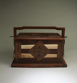 A Carved Wooden Tea Leaves Box