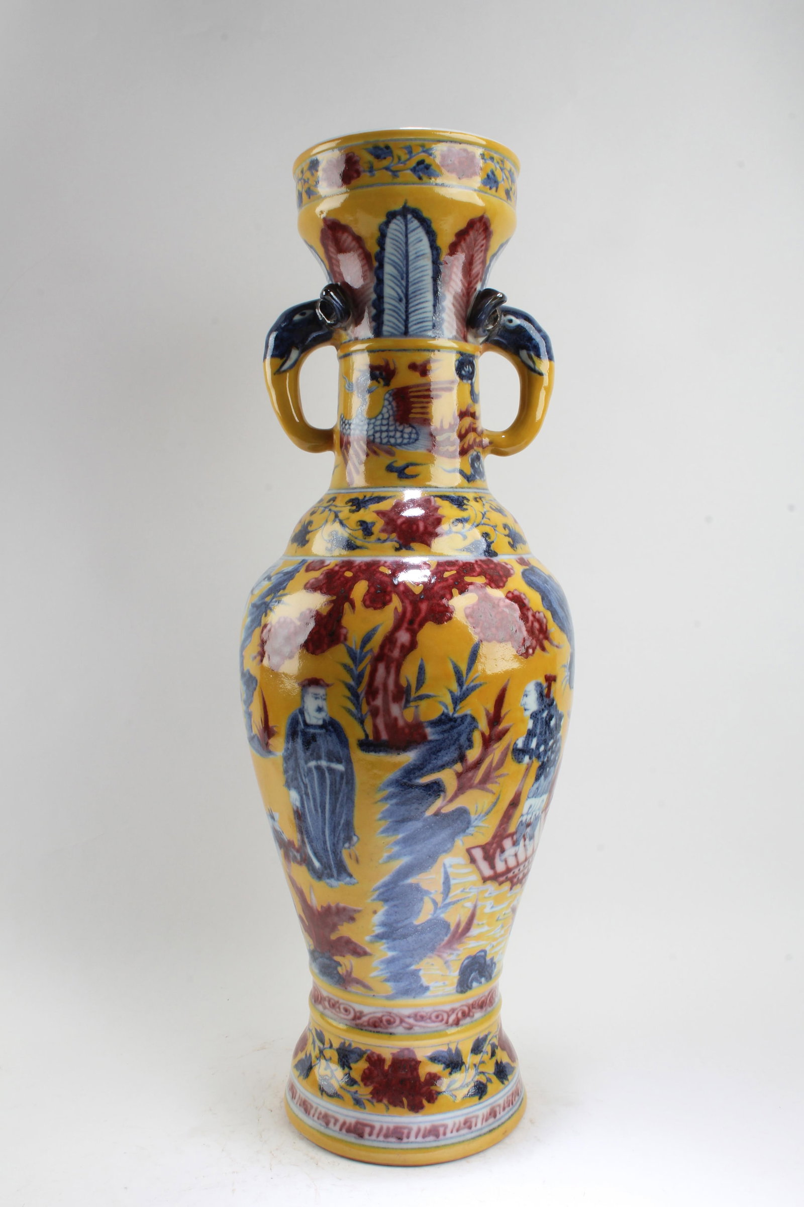 Chinese Famille Jaune Porcelain Vase: Chinese Famille Jaune Porcelain Vase, flanked by twin handles. A four character mark is imprinted at the base. Height: 22.75"
