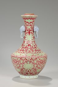 A Yangzhi Red Vase With Lotus Scrolls and Handles