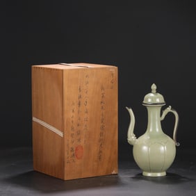 A Yue Ware Secret Color Celadon Ewer with Dragon Handle