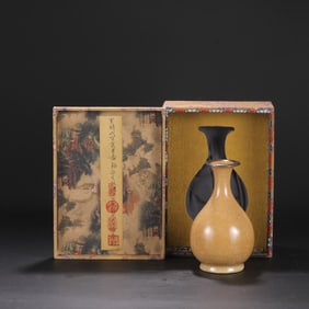 A Guan Ware Beige Glazed Yuhuchun Vase with Silver Rim