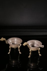 A Pair Of Gilt Silver Wine Vessels With Beast Heads