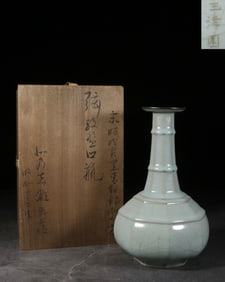 A Celadon Glazed Octagonal Vase With Silver-Mounted Rim