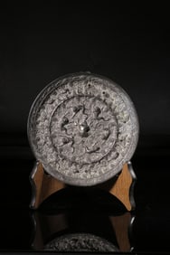 A Bronze Mirror With Sea Beast And Grape Motif