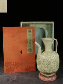 A Yaozhou Ware Ewer With Incised Floral Design