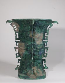 A Bronze He Zun With Beast Face And Red Spots