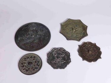 A Group Of 5 Bronze Mirrors