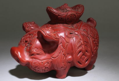 A Cinnabar Lacquer Pig Ornament