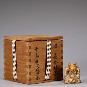 A Gilt Bronze Mythical Beast Paper Weight