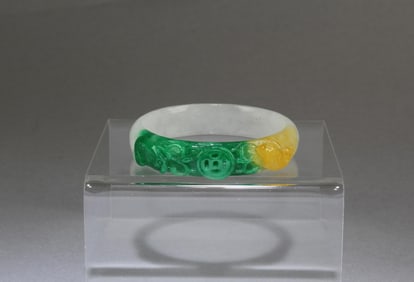 A Carved Jade Bangle