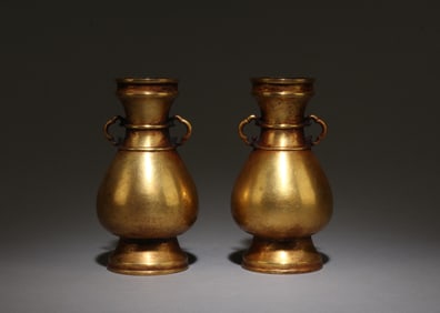 A Pair of Bronze Vases