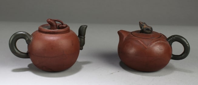 A Group of Two Zisha Teapots