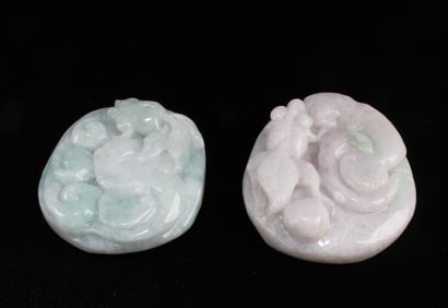 A Group of Two Jade Pendants