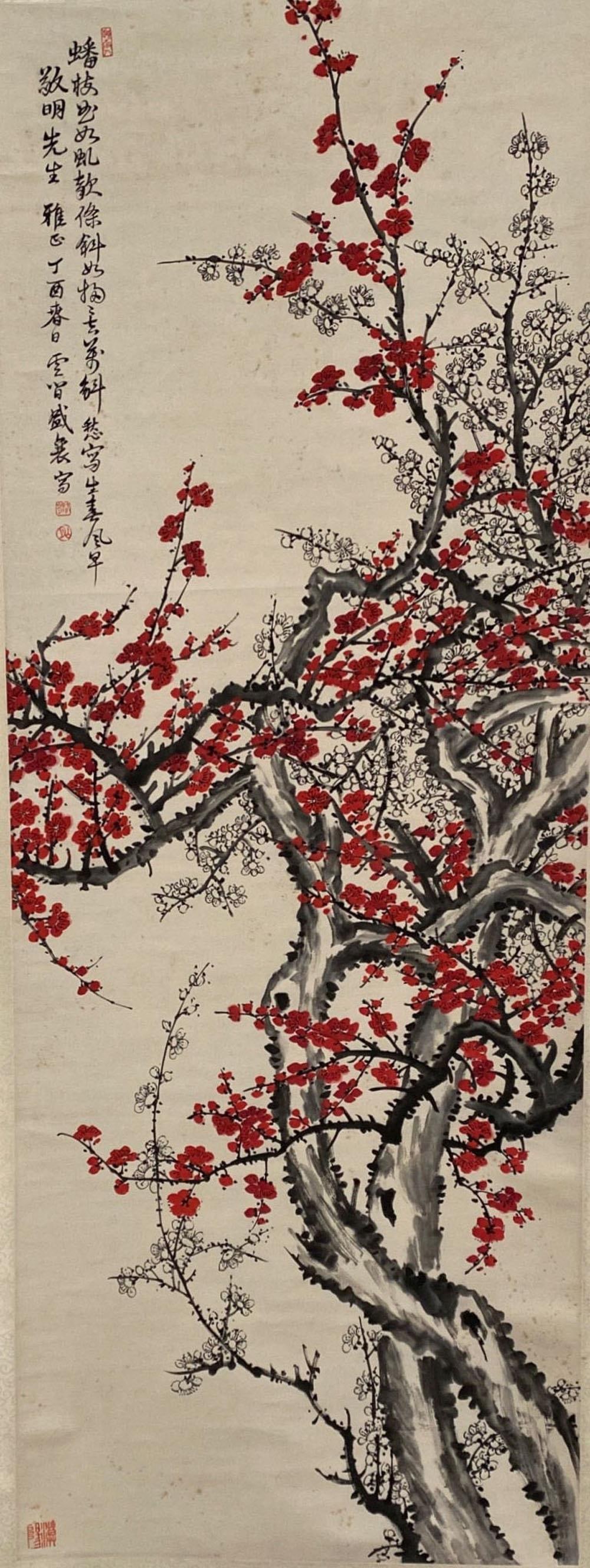 Chinese Hanging Scroll Painting: Ink and color on paper, depicting plum flowers, signed with seal attributed Guan Shan Yue. Length: 19.75" Height: 53.75"