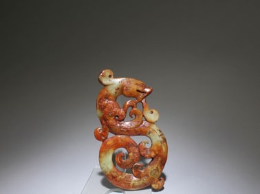 A Carved Jade Dragon Pendant