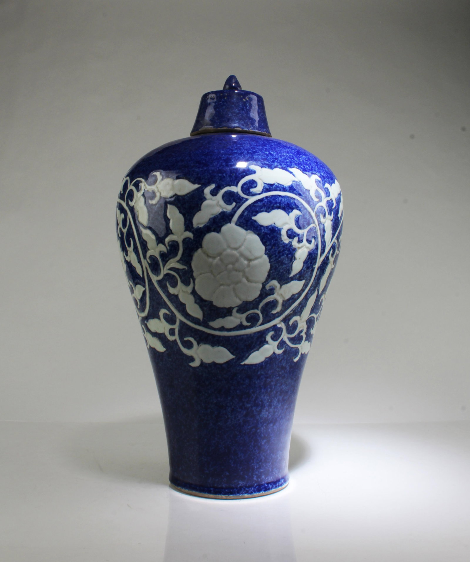 A Blue Color Porcelain Meiping Vase: A Blue Color Porcelain Meiping Vase with lid. Height: 18.5"