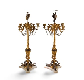 A Pair of Western Styled Candle Holders