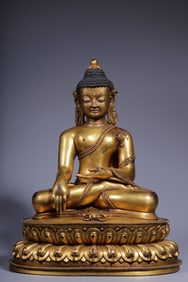 A Gilt Bronze Acalanatha Buddha Statue