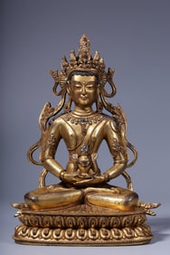 A Gilt Bronze Inlaid Turquoise Longevity Buddha Statue
