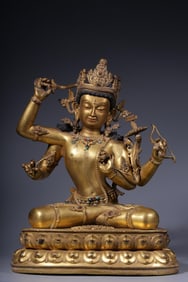 A Gilt Bronze Inlaid Four-Armed Manjushri Statue