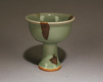 A Celedon Glazed Ceremonial Cup