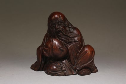 A Wooden Carving of the Longevity Deity