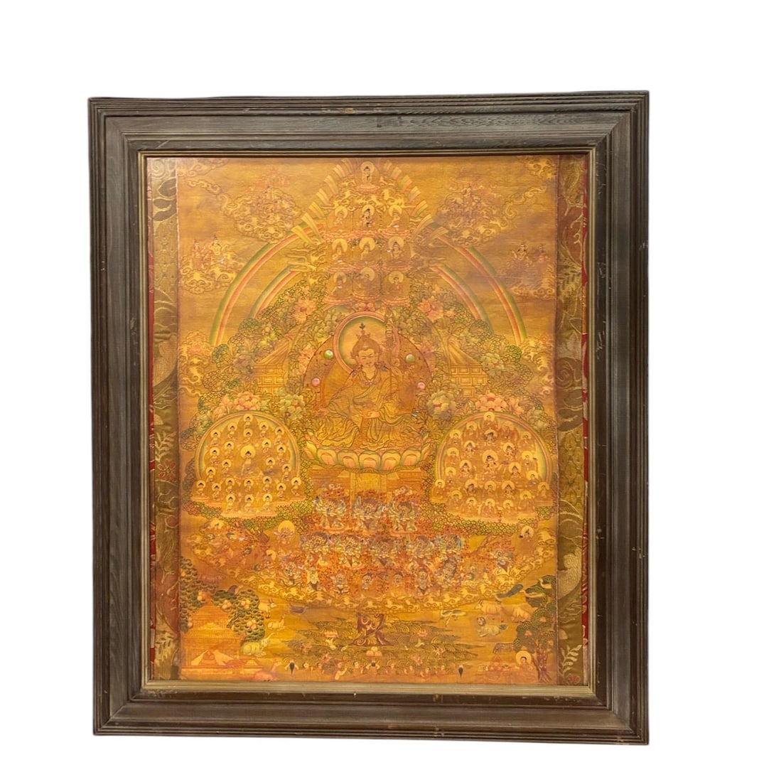 A Tibetan Thangka: A Tibetan Thangka. Outer Dimension: 25.25" x 29.25", Inner Dimension: 16.75" x 23.75".