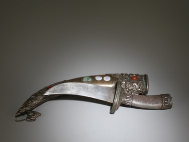 A Bronze Ornament with Inlaid Jewels