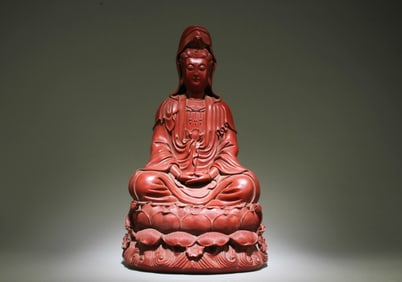 A Chinese Cinnabar Lacquer Guanyin Statue