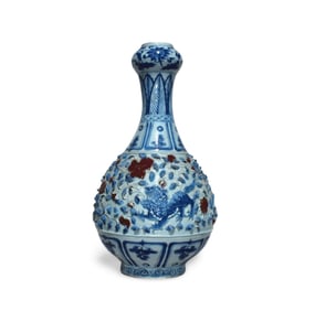 A Blue, White, and Red Vase