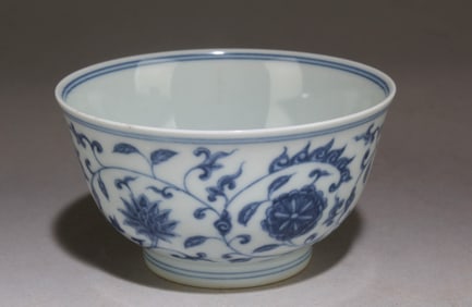 A Blue and White Chinese Cup with a Floral Pattern