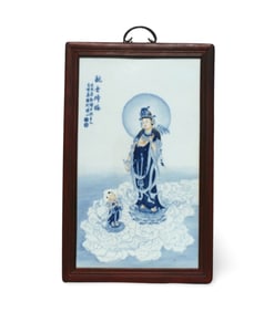 A Framed Blue, White, and Red Guanyin Plaque