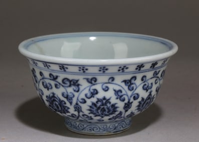A Blue and White Chinese Cup with a Floral Pattern