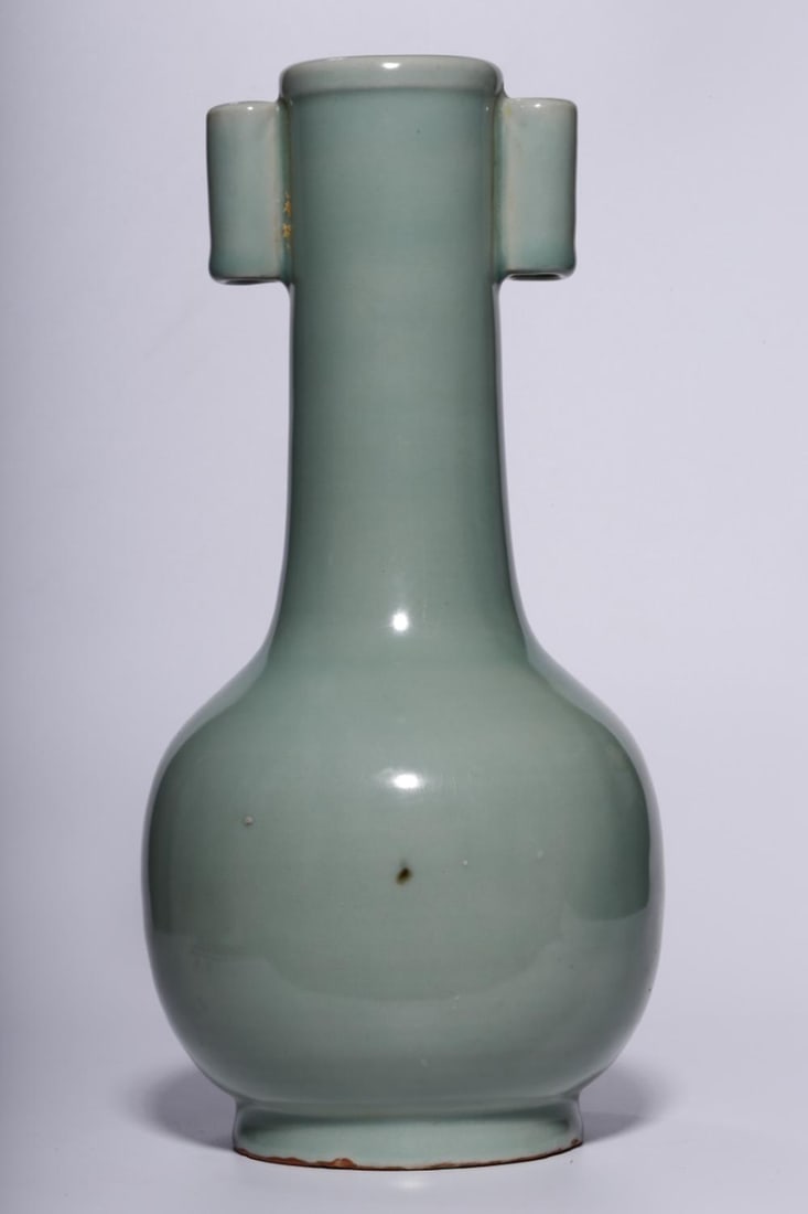 A Longquan Celadon Double-Handled Vase: A Longquan Celadon Double-Handled Vase. Height: 10.43in; Diameter: 5.12in; Weight: 2.37lbs.