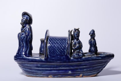 A Blue Glazed Scholar Figurine