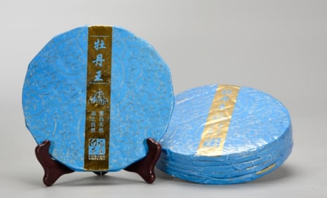 A Set of Five White Tea Cakes