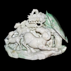 A Jadeite Carving of Three Ram with Lotus