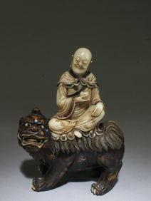 A Carved Soapstone Figurine