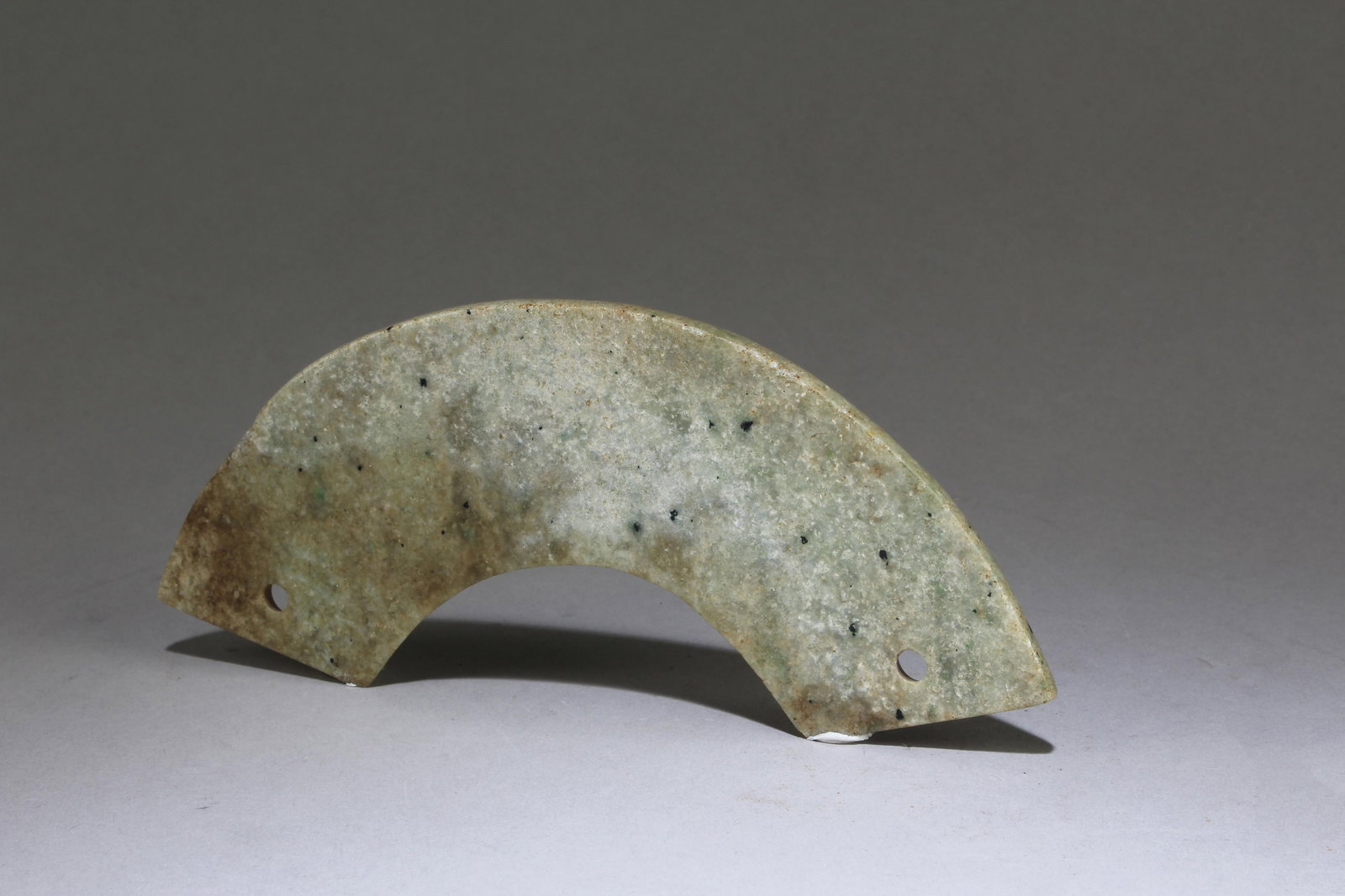 A Chinese Celadon Jade: A Chinese Celadon Jade. Dimensions: 6.7" X 1.9"