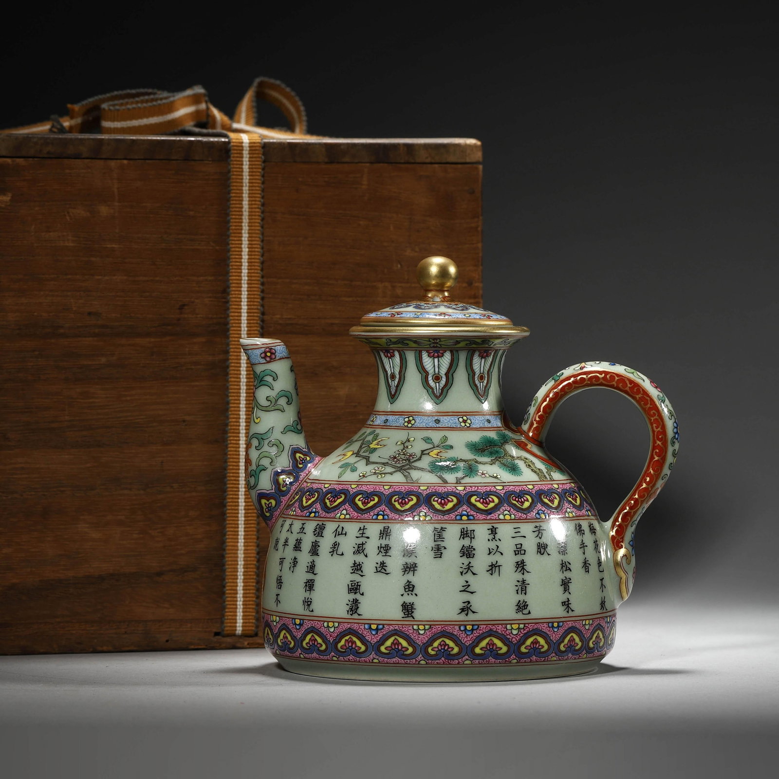 Green-Ground’ Yangcai ‘Imperial Inscription’ Teapot: Green-Ground’ Yangcai ‘Imperial Inscription’ Teapot. Length: 5.71" Width: 4.53" Height: 5.12"